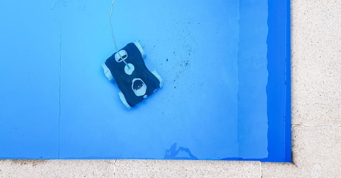 Swimming pool cleaner robot during vacuum service, maintenance.
